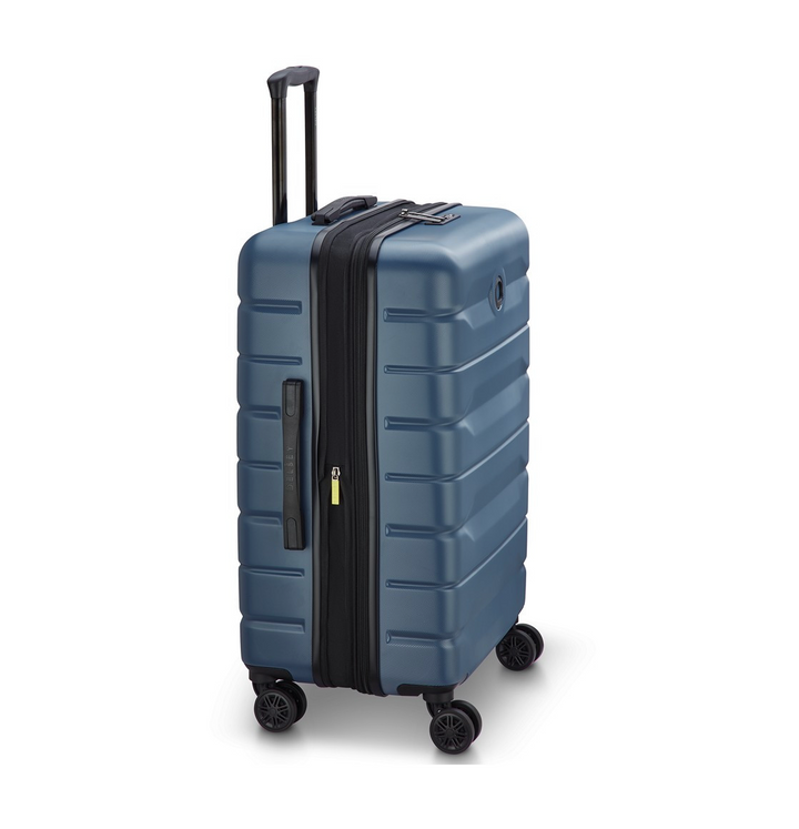 Side angle of a Blue Delsey suitcase with wheels and a handle on a white background