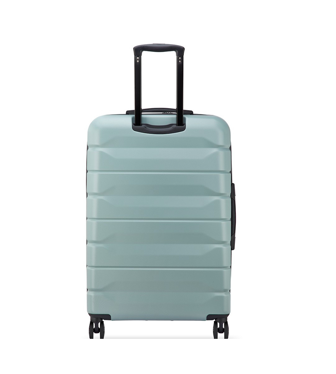 Back of a Sage Green Delsey suitcase with black wheels and handle on a white background