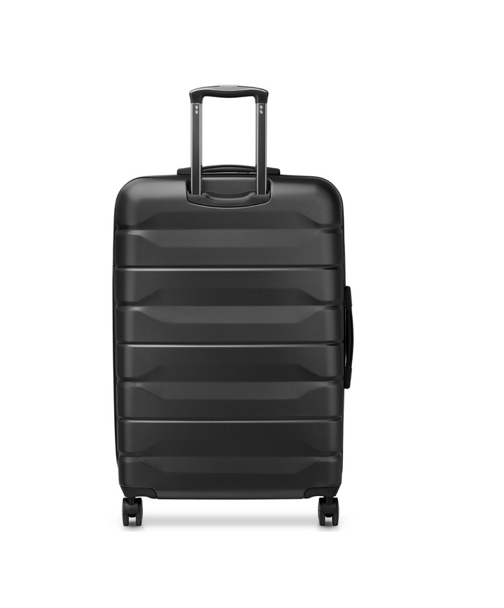 Back of a Black Delsey suitcase with black handle and wheels on a white background