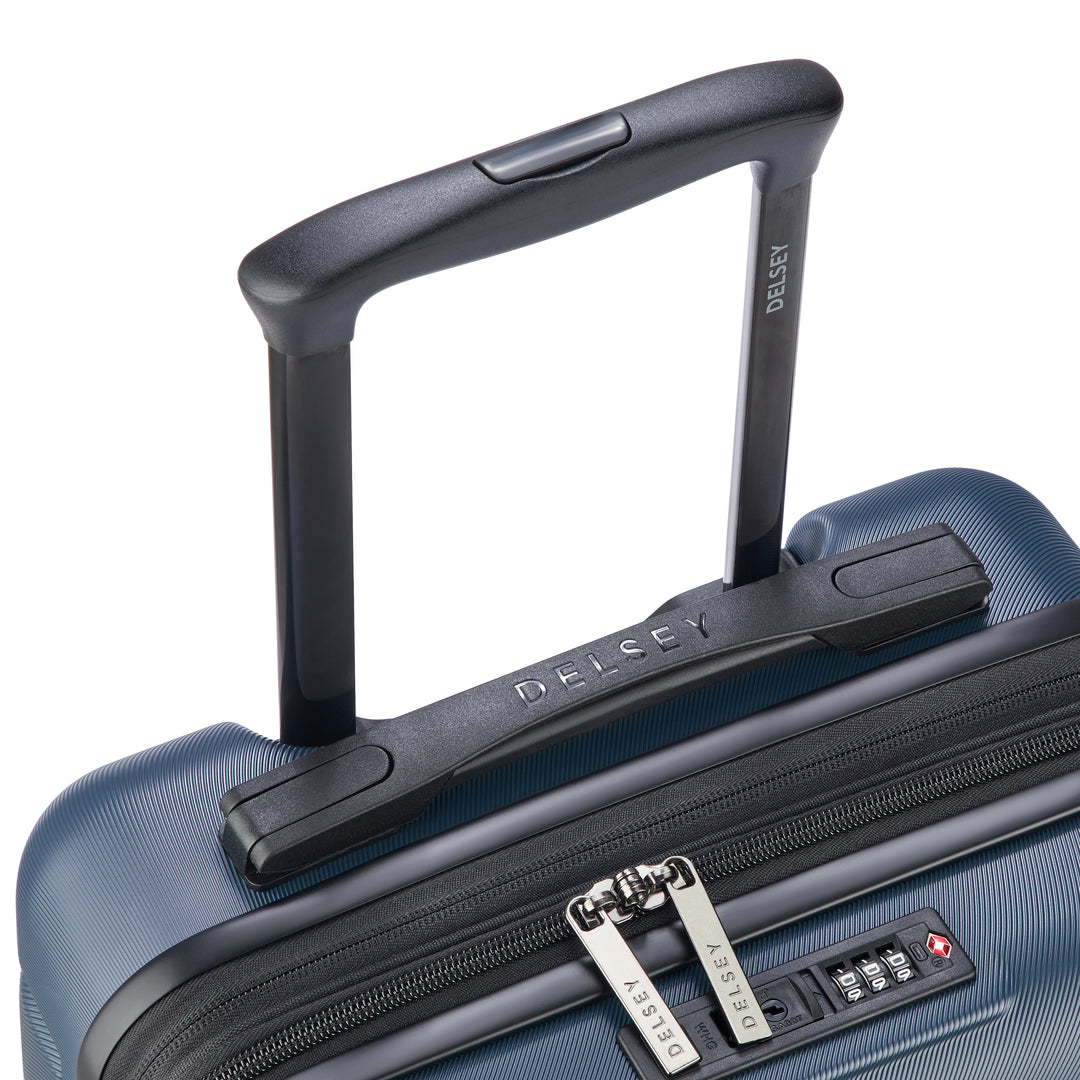Close-up of a blue suitcase handle and zipper with 'Delsey' branding on a white background.