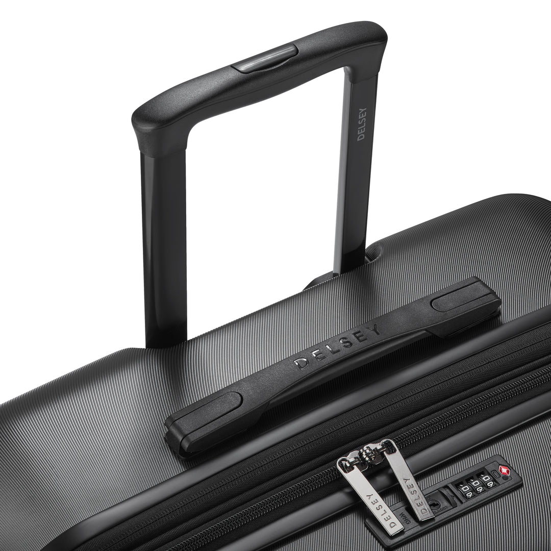 Black suitcase with handle and visible Delsey brand logo on a white background