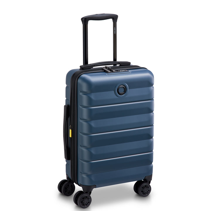 Blue Delsey suitcase with black handle and wheels on a white background