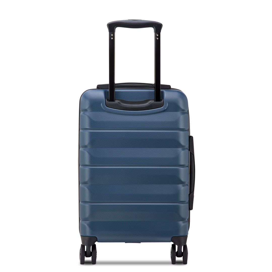Back of a blue suitcase with a black handle on a white background